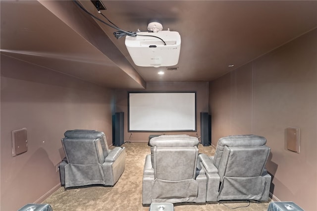 home theater featuring light colored carpet