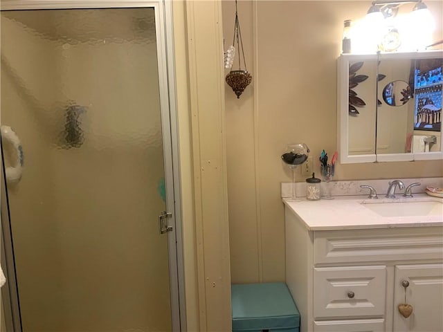 bathroom with vanity and an enclosed shower