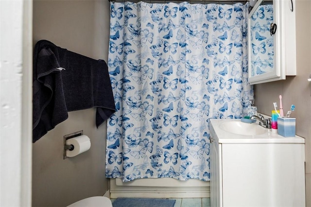 bathroom with vanity and toilet