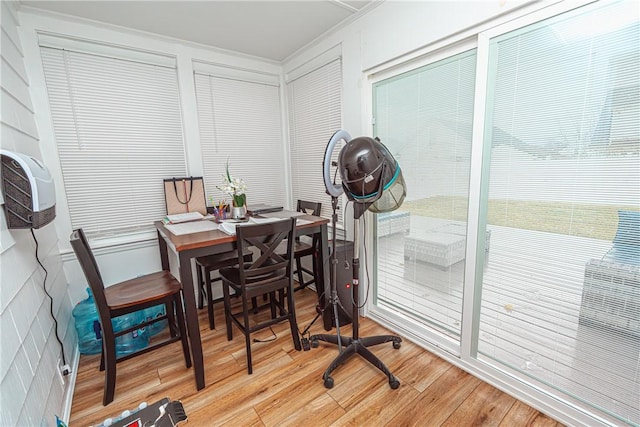 dining area with hardwood / wood-style floors