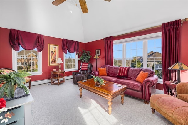 carpeted living room with a high ceiling, ceiling fan, plenty of natural light, and baseboard heating