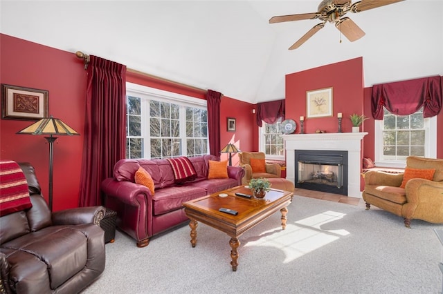 living room featuring high vaulted ceiling and ceiling fan