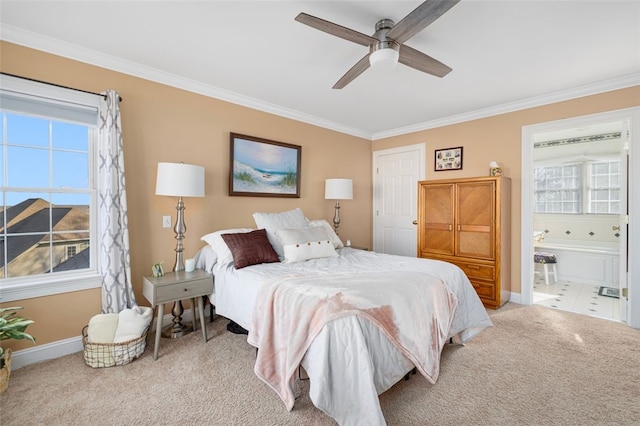 carpeted bedroom featuring crown molding, ceiling fan, and connected bathroom