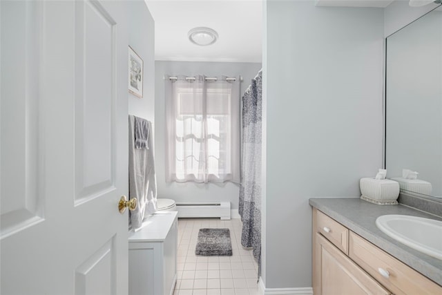 bathroom featuring a baseboard radiator, vanity, tile patterned floors, and toilet