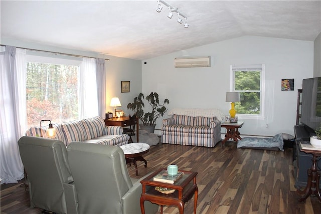 living room featuring dark hardwood / wood-style flooring, a wall mounted AC, and vaulted ceiling