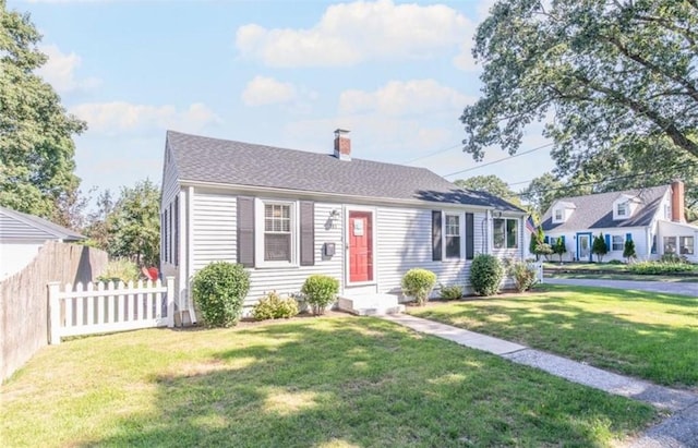 view of front of property with a front lawn