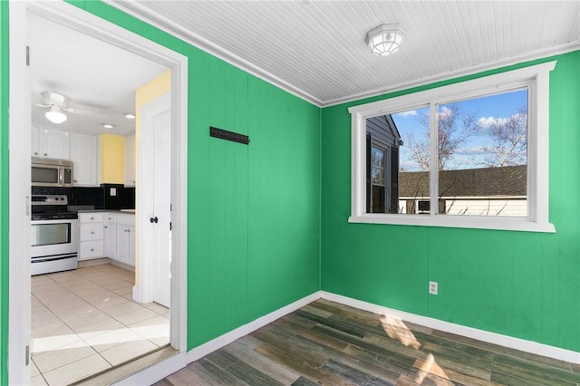 spare room featuring light hardwood / wood-style floors