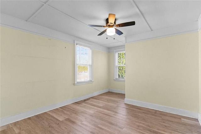 spare room featuring ceiling fan and light wood-type flooring