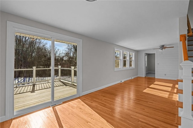 unfurnished living room featuring hardwood / wood-style flooring