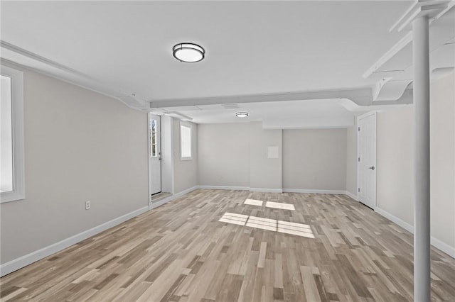 basement featuring light hardwood / wood-style floors