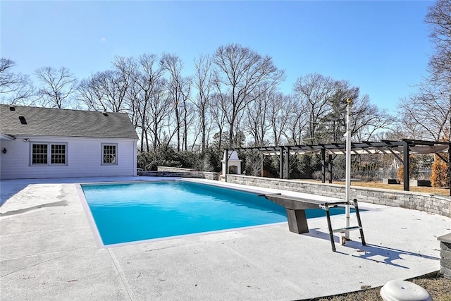 pool featuring a pergola and a patio