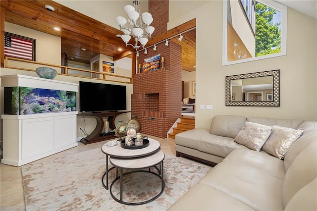 living room featuring light tile patterned flooring, high vaulted ceiling, a chandelier, track lighting, and wooden ceiling