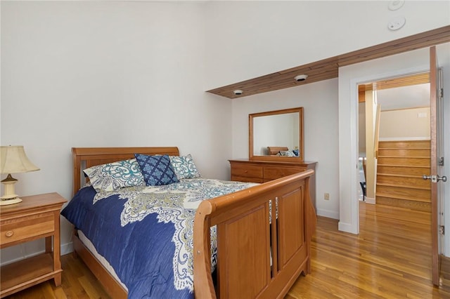 bedroom with light hardwood / wood-style flooring