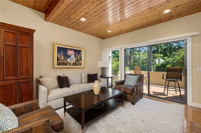 living room featuring wood ceiling and light hardwood / wood-style floors