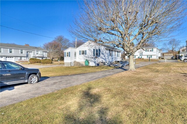 view of front of house with a front lawn