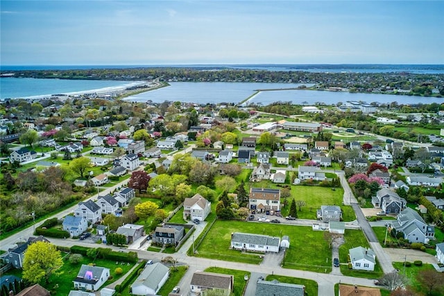 aerial view with a water view and a residential view