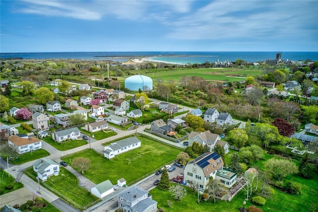 birds eye view of property featuring a water view and a residential view