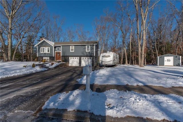 bi-level home featuring a garage