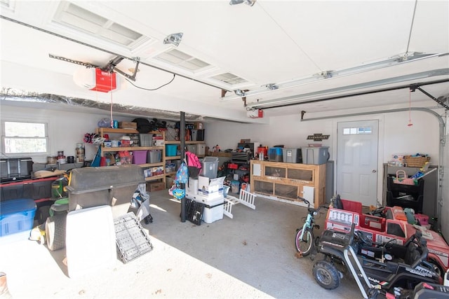 garage featuring a garage door opener