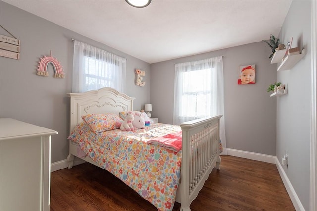 bedroom featuring dark hardwood / wood-style floors