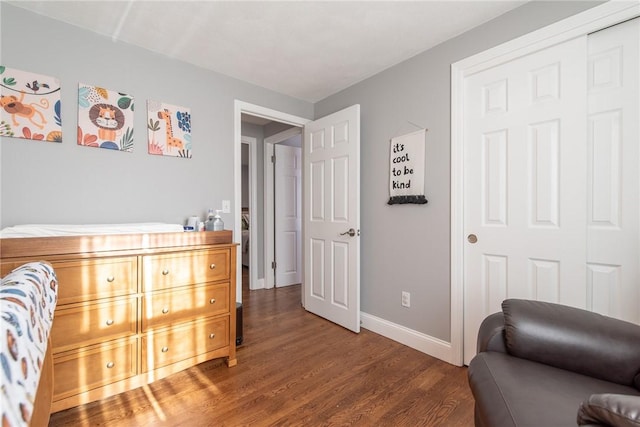 living area with dark wood-type flooring