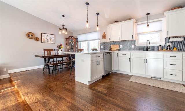 kitchen with pendant lighting and white cabinets