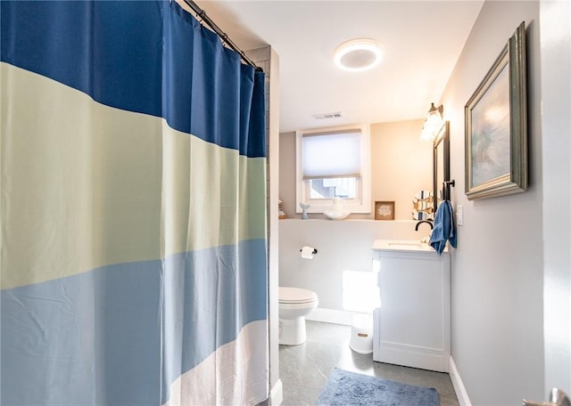 bathroom with vanity, toilet, and a shower with shower curtain