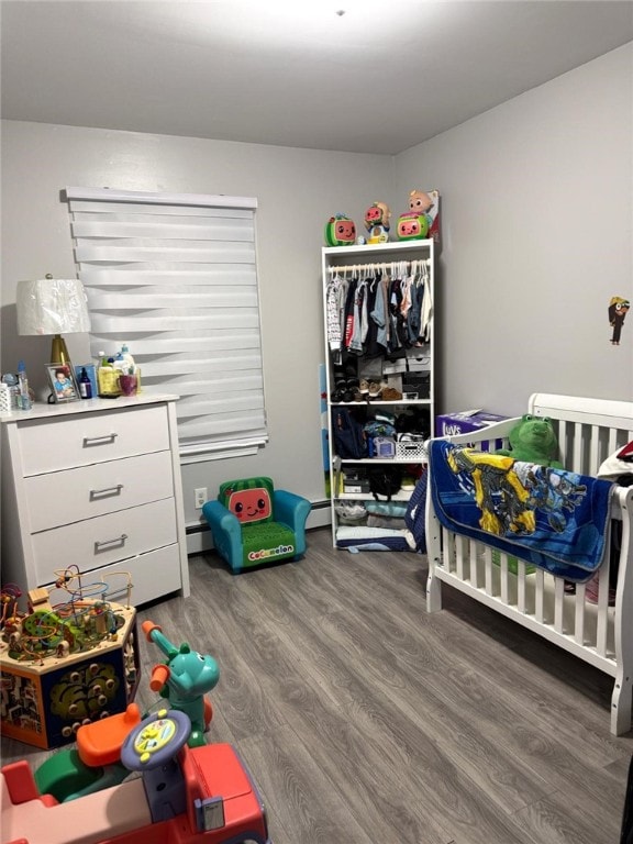 bedroom with hardwood / wood-style floors