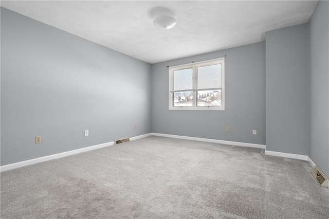 unfurnished room with carpet floors