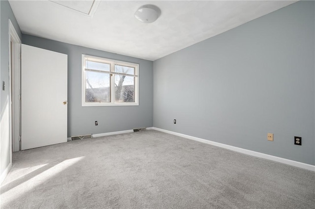 unfurnished bedroom featuring light carpet