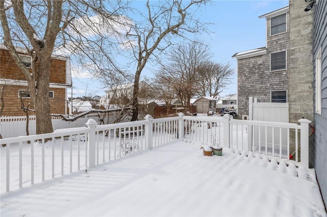 view of snow covered deck