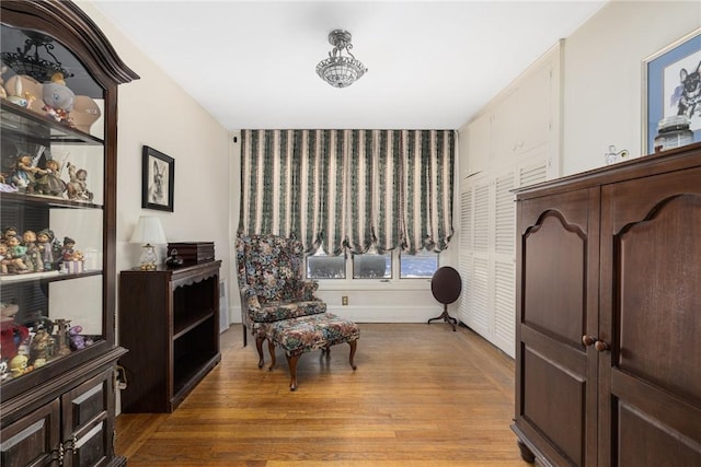 living area with light hardwood / wood-style floors