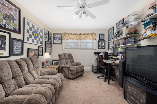 home office with ceiling fan, light colored carpet, and a baseboard heating unit