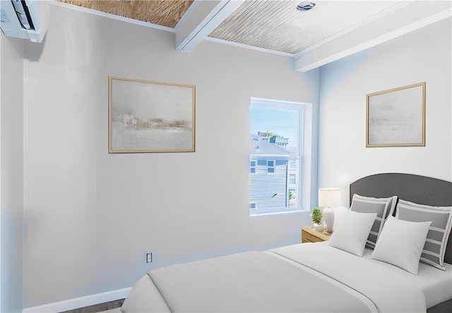 bedroom with ornamental molding and an AC wall unit