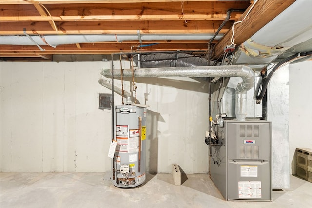 utility room featuring heating unit and water heater