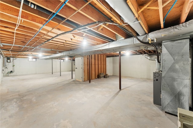 basement featuring heating unit