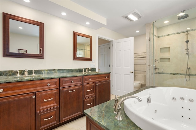 full bathroom with shower with separate bathtub, vanity, tile patterned floors, and toilet