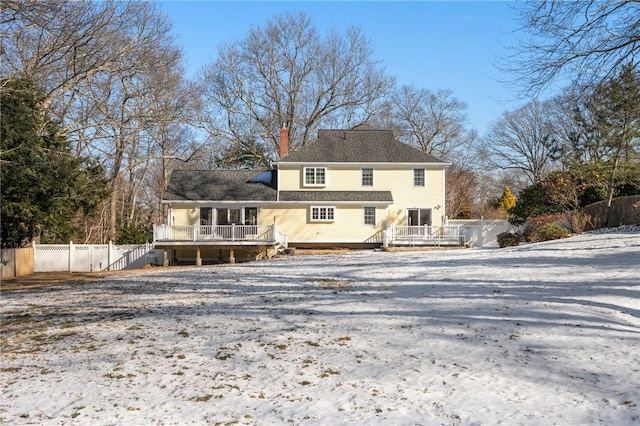 rear view of property with a deck