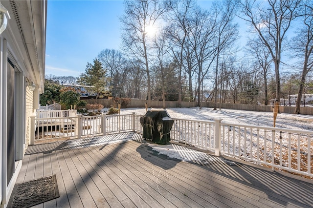 wooden terrace with area for grilling