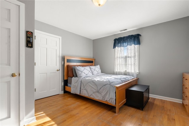 bedroom featuring light wood-type flooring