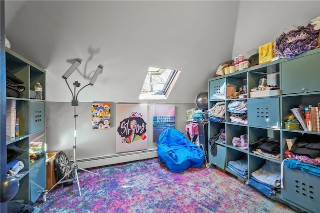 playroom featuring lofted ceiling with skylight and baseboard heating