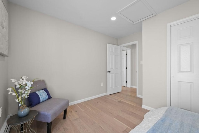 sitting room with light hardwood / wood-style floors