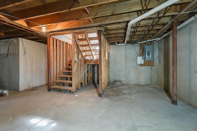 basement featuring electric panel