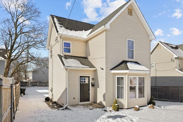 view of snow covered house