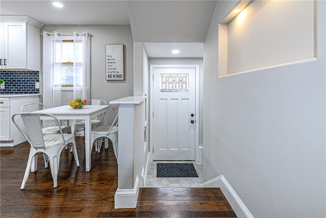 interior space with dark hardwood / wood-style floors