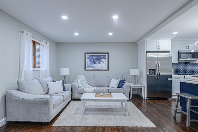 living room featuring dark wood-type flooring