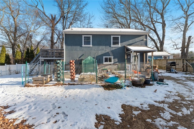 view of front of property featuring a deck