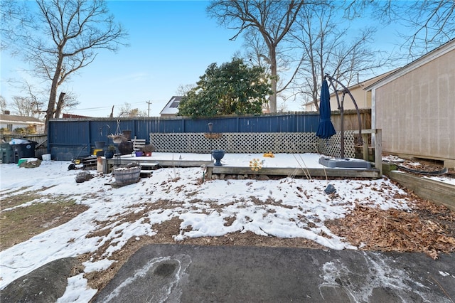 view of yard covered in snow