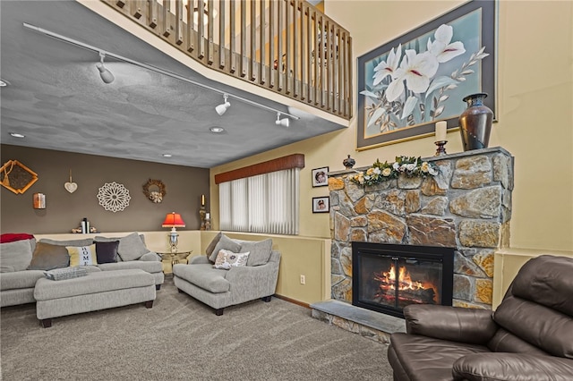 carpeted living room featuring a fireplace