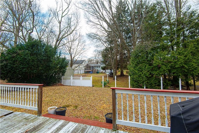 wooden deck featuring area for grilling